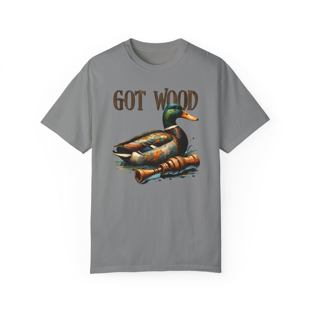 A relaxed-fit, garment-dyed t-shirt featuring a duck design, the Got Wood Tee from Worlds Worst Tees. Made of 100% ring-spun cotton for coziness and durability, with double-needle stitching for longevity.