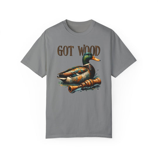 A relaxed-fit, garment-dyed t-shirt featuring a duck design, the Got Wood Tee from Worlds Worst Tees. Made of 100% ring-spun cotton for coziness and durability, with double-needle stitching for longevity.