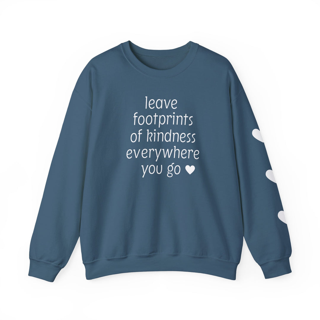 Teal-blue crewneck sweatshirt with leave footprints of kindness everywhere you go ♥️ in white. Right sleeve features white heart shapes.