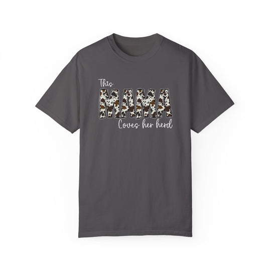 A relaxed fit Mama Herd Tee in grey with cow print and white text. 100% ring-spun cotton, garment-dyed for coziness, double-needle stitching for durability, no side-seams for a tubular shape.
