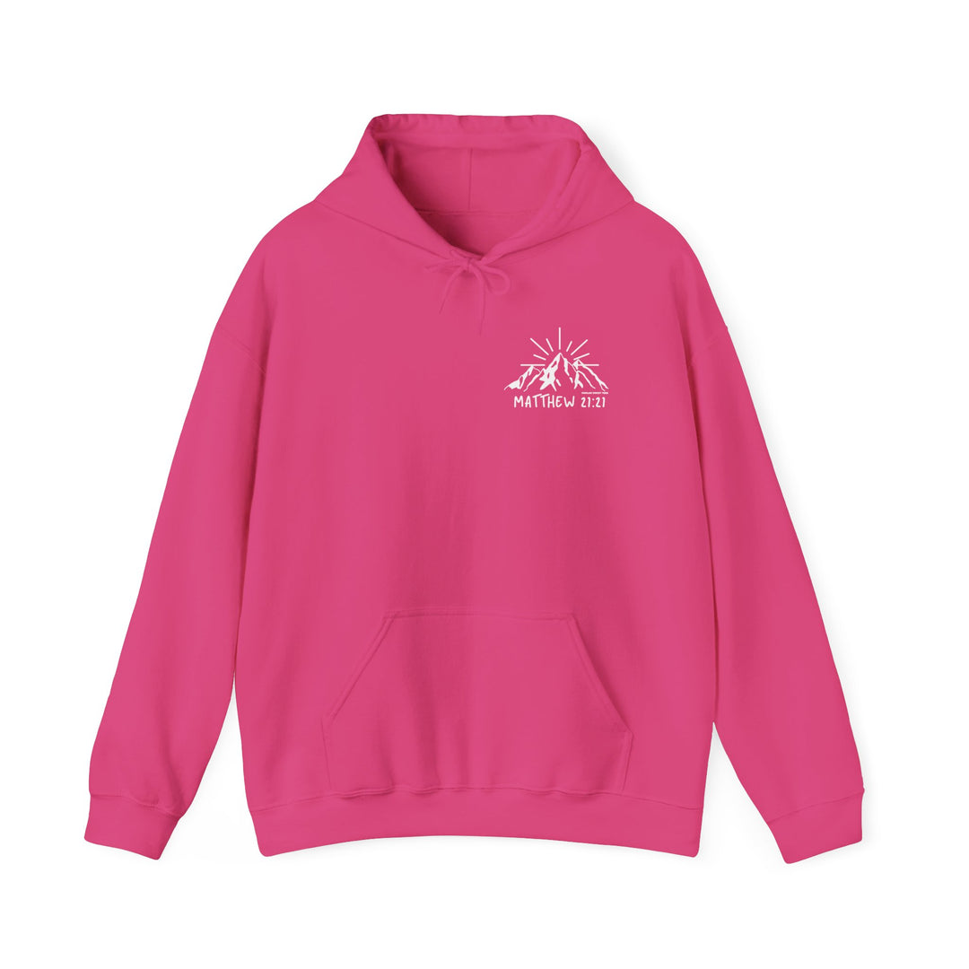 A pink Faith Can Move Mountains Hoodie with a white logo, featuring a mountain and sun rays design. Unisex heavy blend, cotton-polyester fabric, kangaroo pocket, and matching drawstring hood. Plush, warm, and stylish.