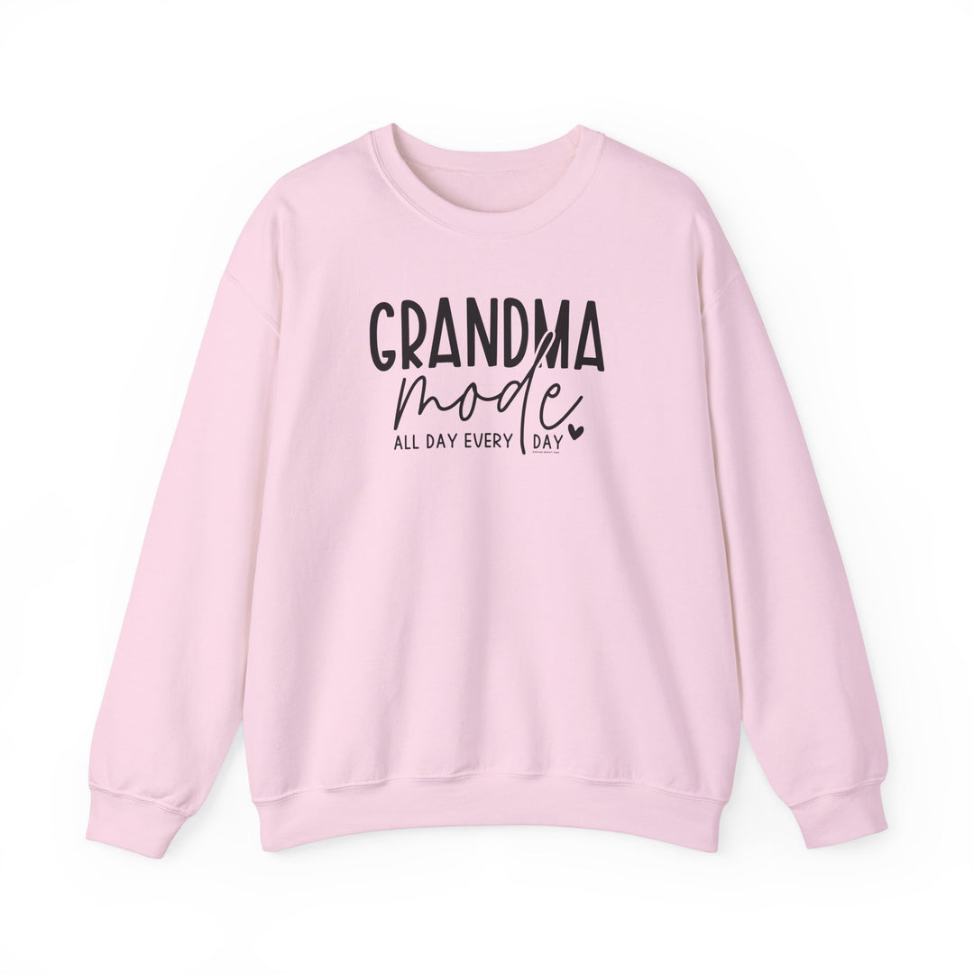 A Grandma Mode Crew unisex sweatshirt in pink with black text. Made of 50% cotton, 50% polyester blend, ribbed knit collar, and no itchy side seams. Medium-heavy fabric, loose fit, true to size.