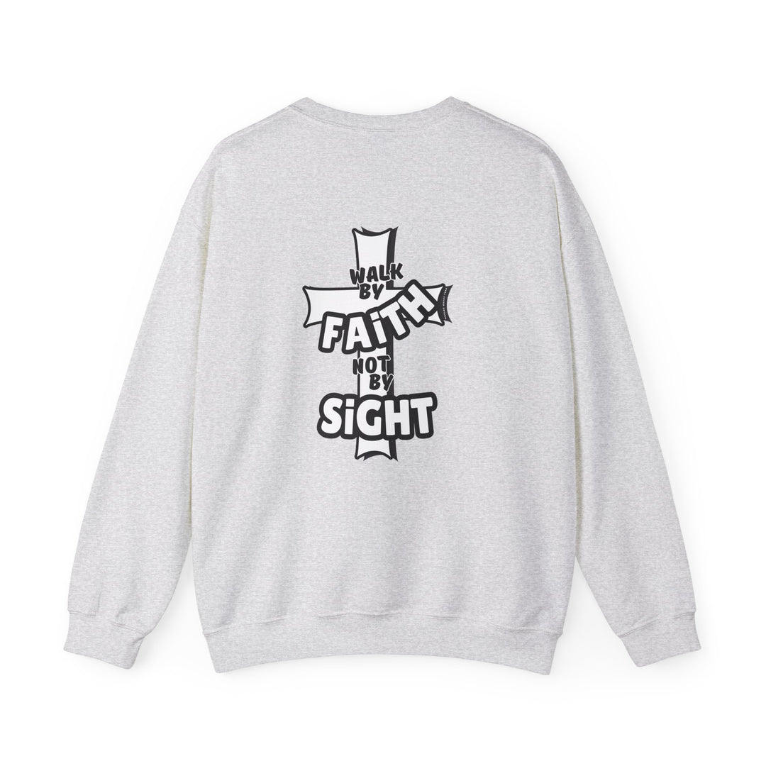 A white crewneck sweatshirt featuring a cross design with text, ideal for comfort and style. Unisex heavy blend made of 50% cotton and 50% polyester, ribbed knit collar, and no itchy side seams. Walk By Faith Not By Sight Crew.