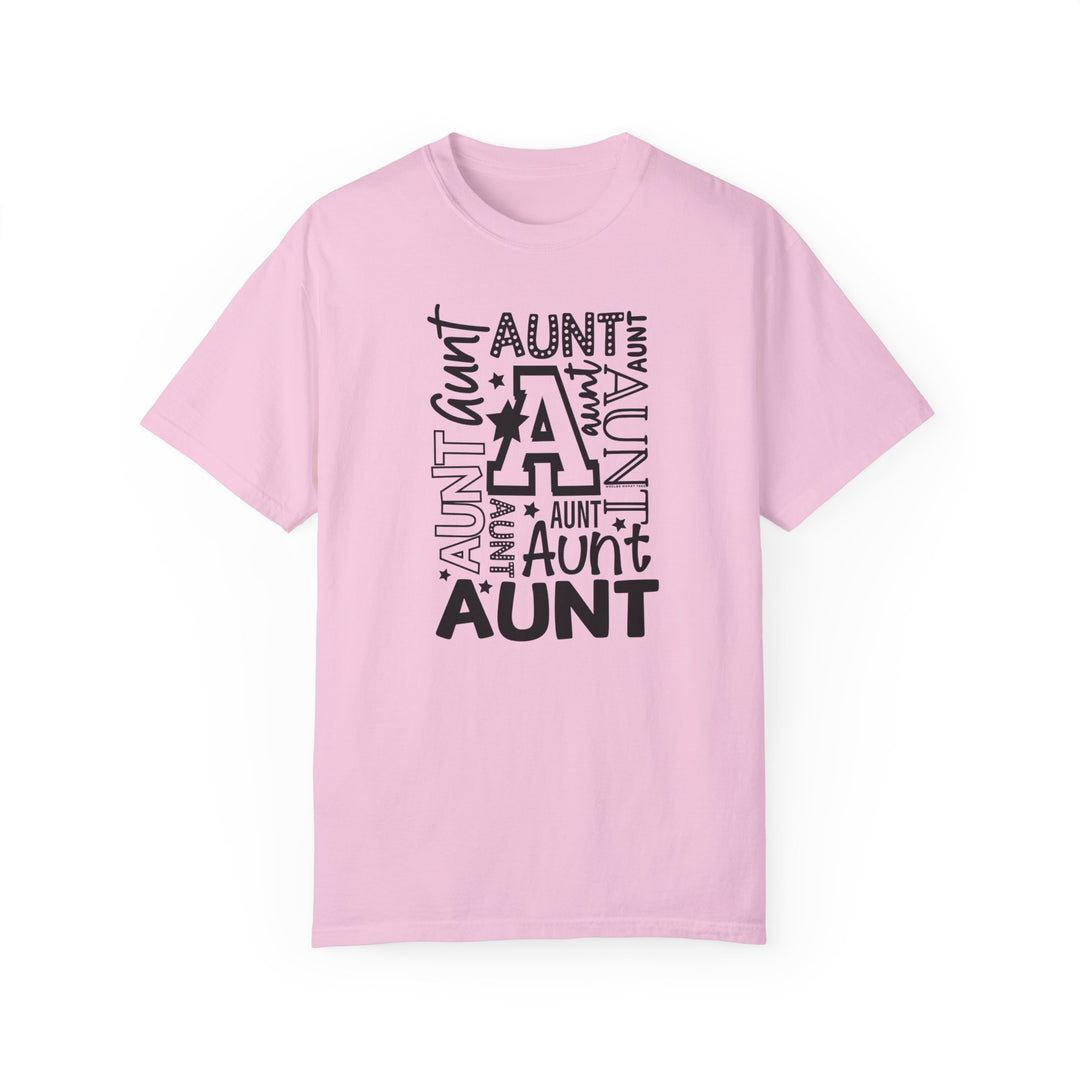 Aunt Tee: Pink shirt with black text, garment-dyed 100% ring-spun cotton, medium weight, relaxed fit, durable double-needle stitching, seamless design for tubular shape.