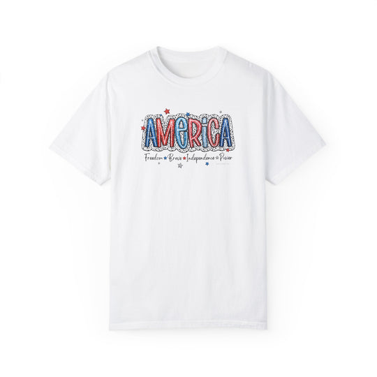 America Tee: White t-shirt with red and blue text. 100% ring-spun cotton, garment-dyed for extra coziness. Relaxed fit, double-needle stitching for durability, no side-seams for a tubular shape. From Worlds Worst Tees.