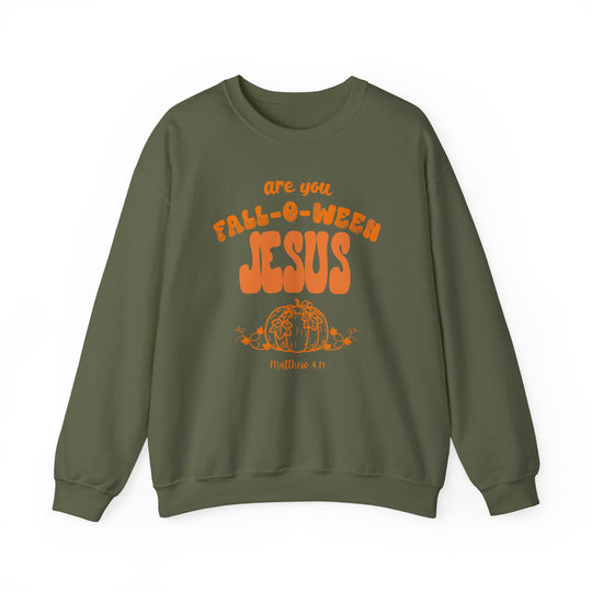 Olive-green crewneck sweatshirt featuring Are You FALL-O-WEEN Jesus in pumpkin-themed font with illustrated pumpkin and Bible reference, Matthew 4:19, across chest.