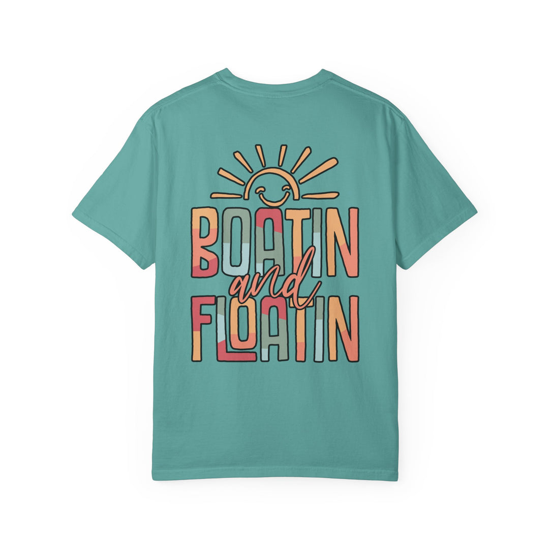 Boatin and Floatin Tee, a relaxed fit, garment-dyed t-shirt made from 100% ring-spun cotton, featuring durable stitching and a classic crew neckline.