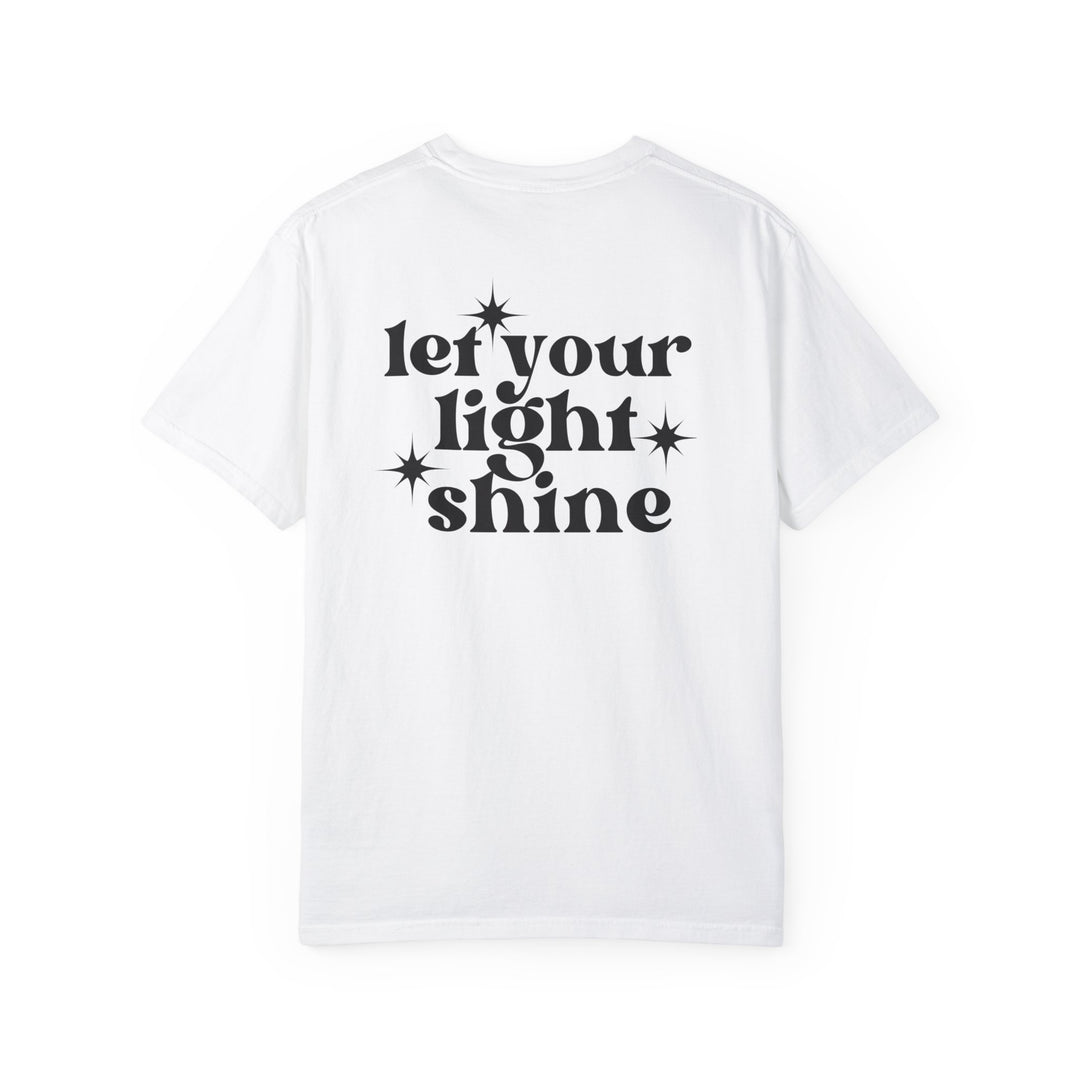 Relaxed fit Let Your Light Shine Tee, a white shirt with black text. 100% ring-spun cotton, garment-dyed for coziness. Durable double-needle stitching, no side-seams for a tubular shape.