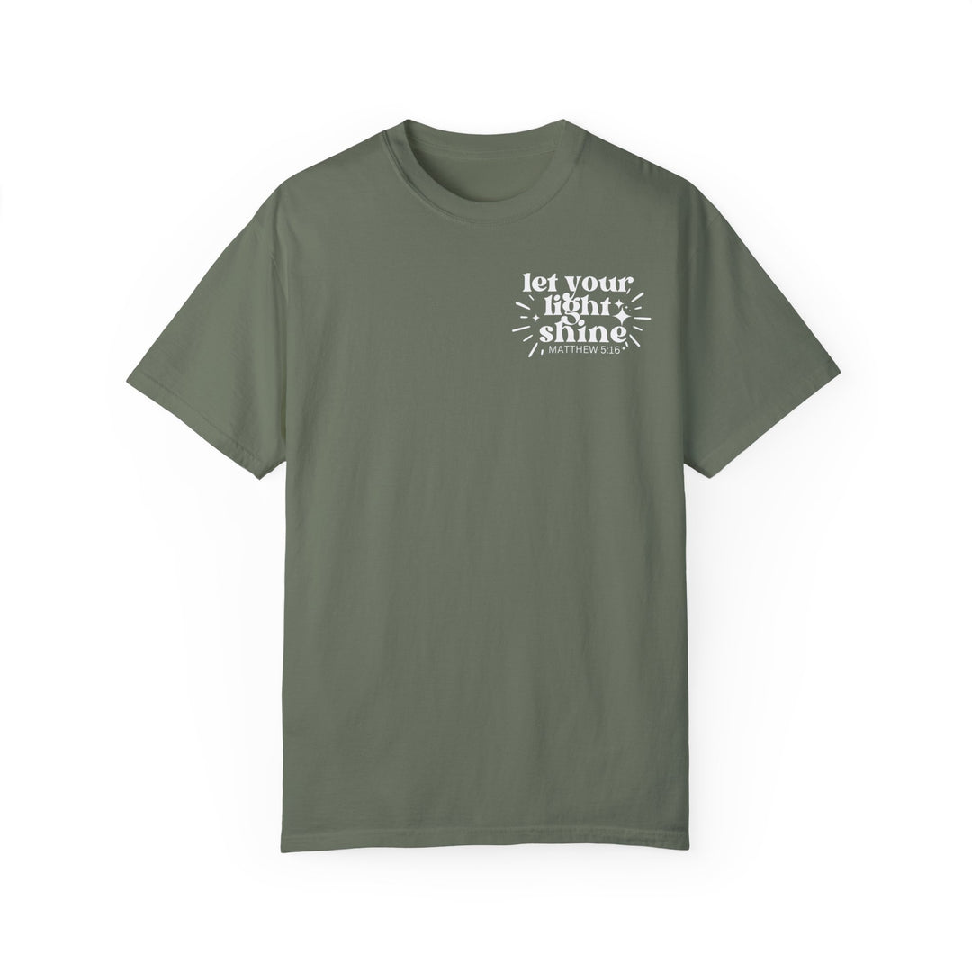 Relaxed fit Let Your Light Shine Tee, a green t-shirt with white text. 100% ring-spun cotton, garment-dyed for coziness. Durable double-needle stitching, no side-seams for a tubular shape.