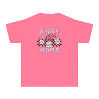 A kids' tee with a sassy message, featuring pink graphics and flowers. Made of soft 100% combed ringspun cotton for comfort and agility. Ideal for active days. Sizes XS to XL available.