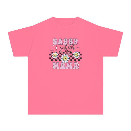 A kids' tee with a sassy message, featuring pink graphics and flowers. Made of soft 100% combed ringspun cotton for comfort and agility. Ideal for active days. Sizes XS to XL available.