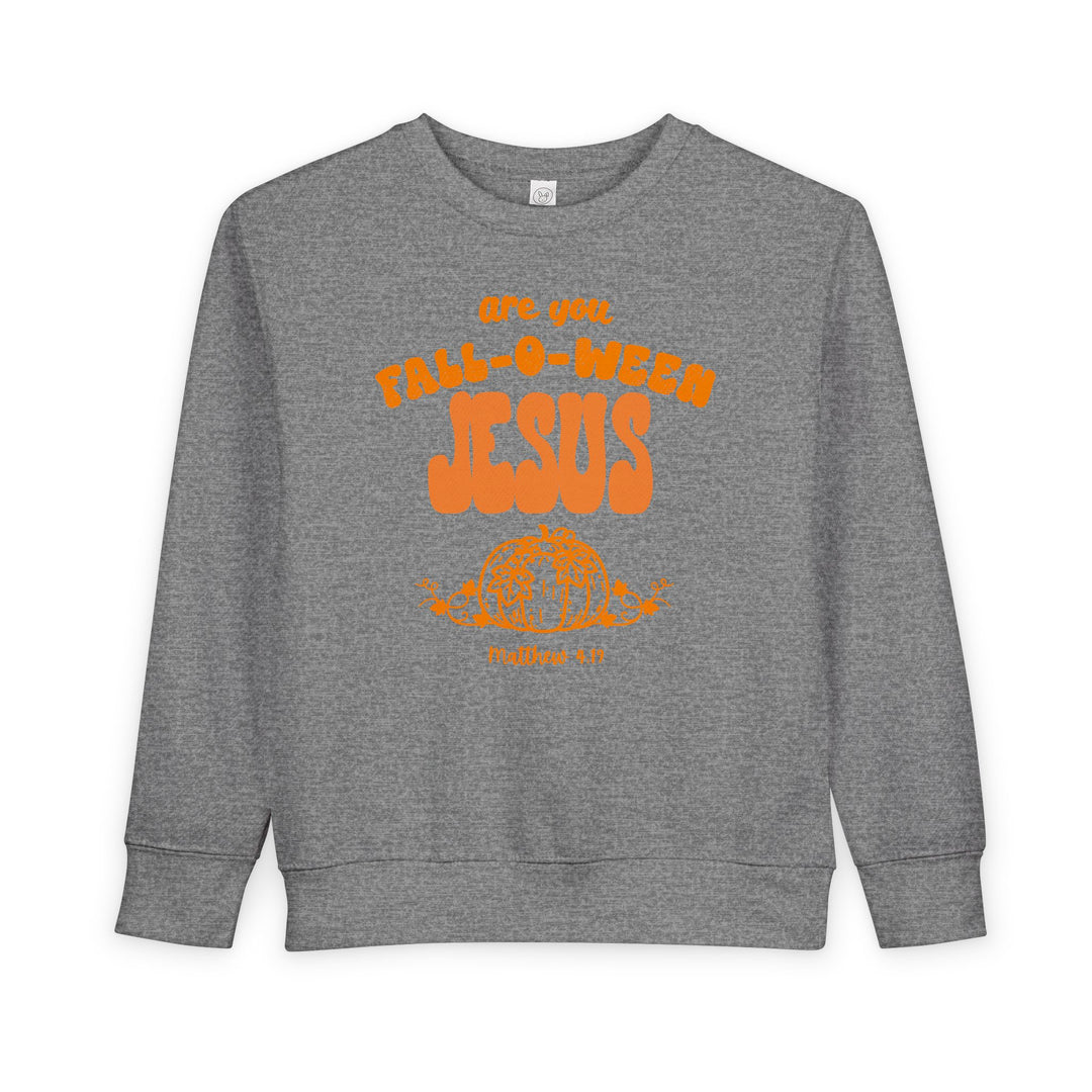 Heather-gray toddler crewneck with playful orange FALL-O-WEEN JESUS graphic, pumpkin illustration, and Matthew 4:19. Soft, durable, ideal for keeping toddlers warm.