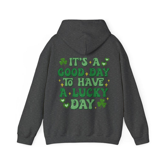 Good Day Lucky Day Hoodie featuring green text on grey, unisex, plush cotton-polyester blend, with kangaroo pocket and matching drawstring, ideal for cold weather.