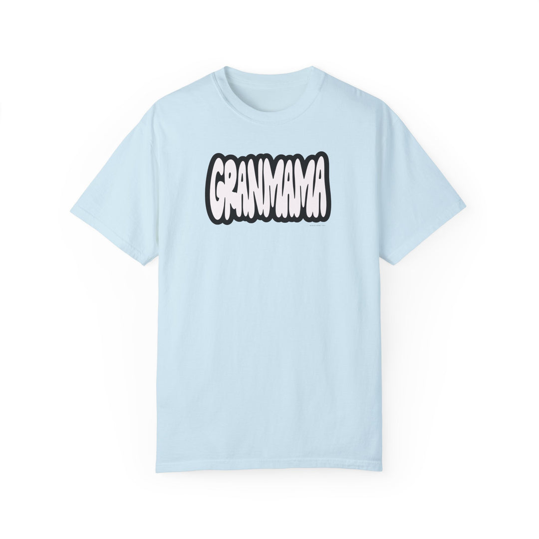 Grandmama Tee: A light blue t-shirt with white text, made of 100% ring-spun cotton. Garment-dyed for extra coziness, featuring a relaxed fit and durable double-needle stitching. Ideal for daily wear.