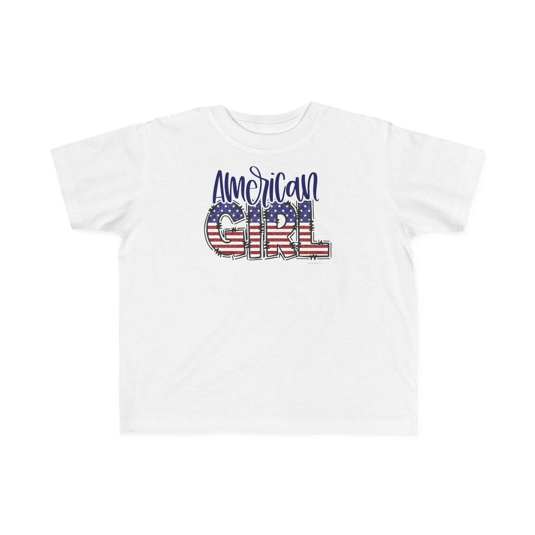 American Girl Toddler Tee featuring a red, white, and blue flag design on a white shirt. Soft 100% combed ringspun cotton, tear-away label, classic fit. Available in sizes 2T to 5-6T.