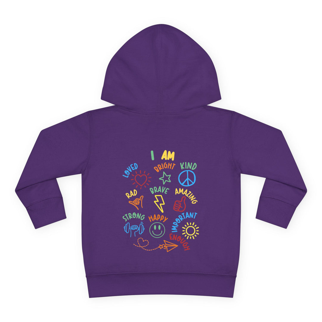 Back view of a purple I AM Toddler Hoodie with colorful affirmations and doodles, featuring a jersey-lined hood and side-seam pockets for comfort.