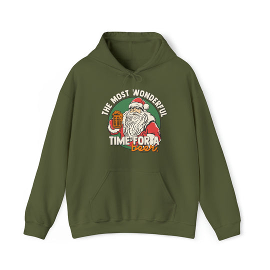A green sweatshirt featuring Santa Claus holding a beer, perfect for festive relaxation. Unisex heavy blend, cotton-polyester fabric, kangaroo pocket, and drawstring hood. Ideal for warmth and comfort.
