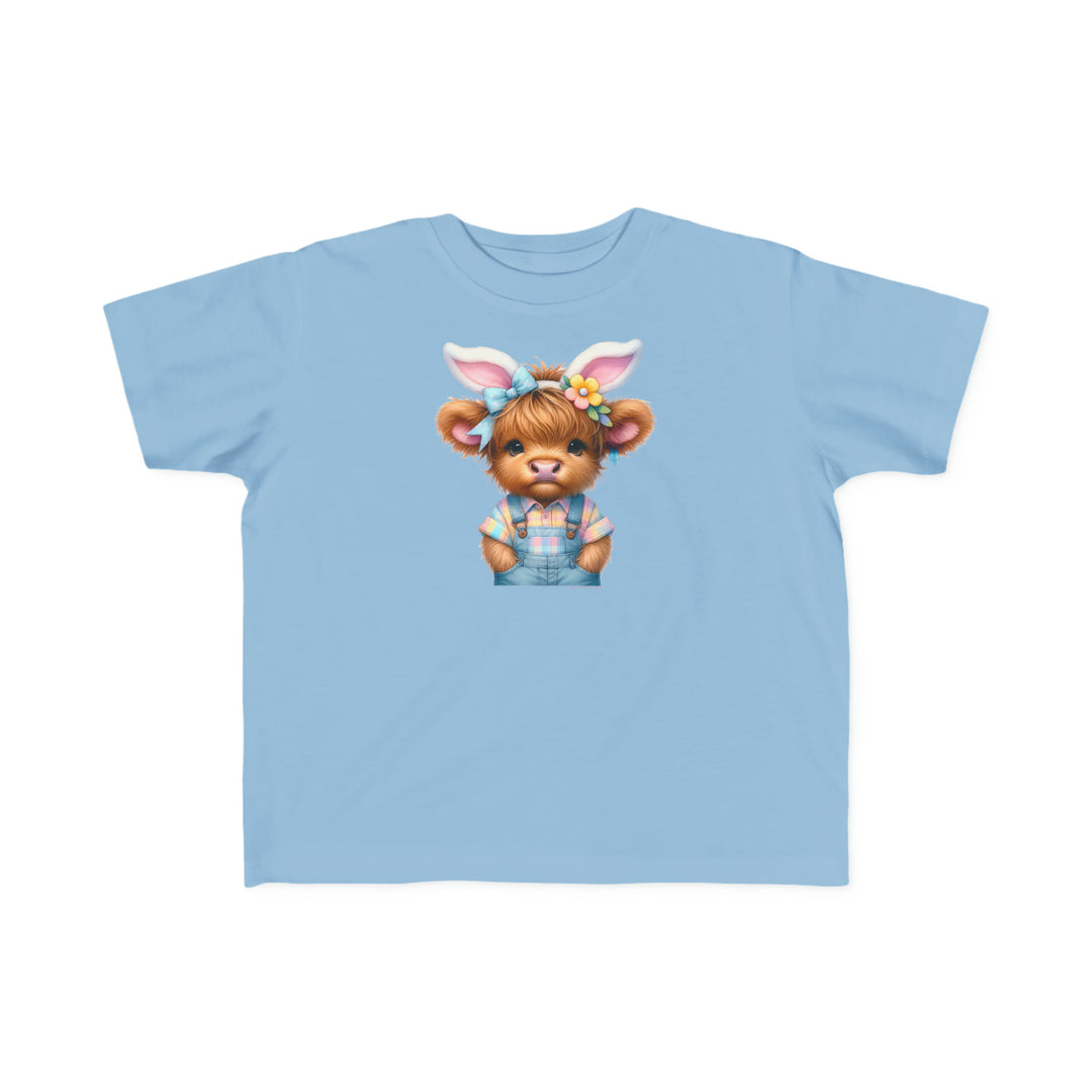 Easter Cow Toddler Tee: Blue shirt with cartoon cow in bunny ears. Soft, durable fabric for sensitive skin, perfect for first adventures. 100% combed ringspun cotton, tear-away label, true to size.