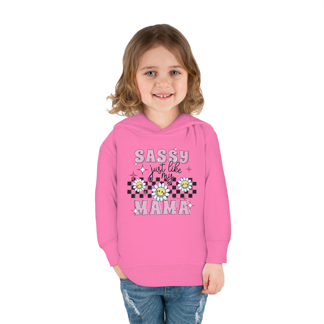 Toddler hoodie with jersey-lined hood, cover-stitched details, and side seam pockets. Sassy Like My Mama design. 60% cotton, 40% polyester blend. Sizes: 2T, 4T, 5-6T. Medium fabric.
