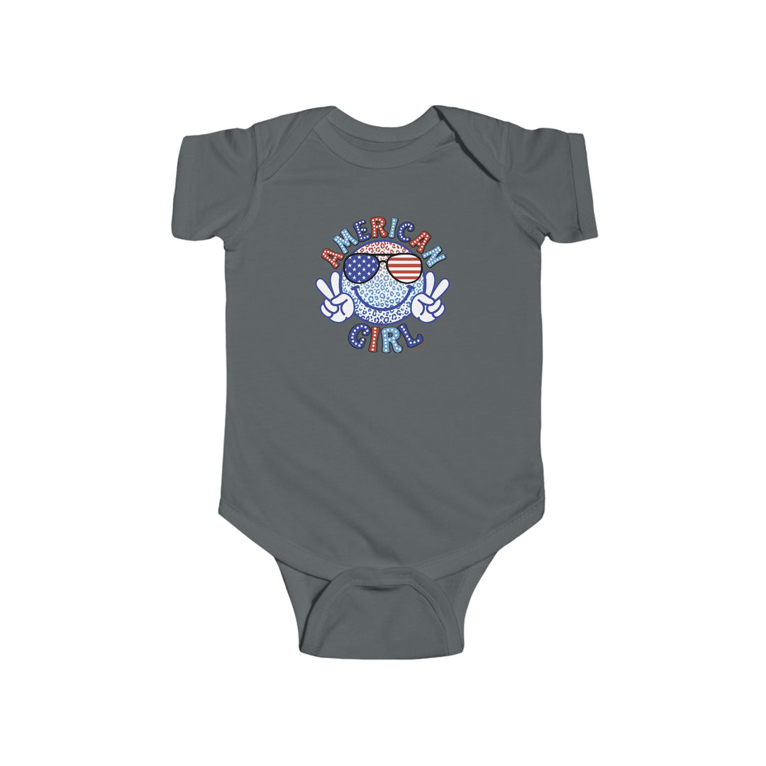 American Girl Onesie featuring a cartoon peace sign and flag on a grey baby bodysuit. 100% cotton, light fabric with ribbed bindings and plastic snaps for easy changing. Ideal for infants.