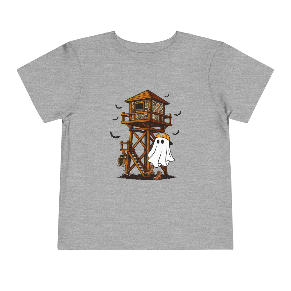 Ghost Hunter Toddler Tee features a cartoon hunting scene with a ghost, hunting blind, and bats. Made from soft cotton for everyday comfort.