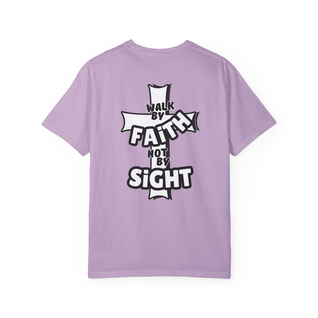 A relaxed-fit Walk By Faith Not By Sight Tee in purple, featuring a cross and text design. Made of 100% ring-spun cotton for comfort and durability, with double-needle stitching and no side-seams.
