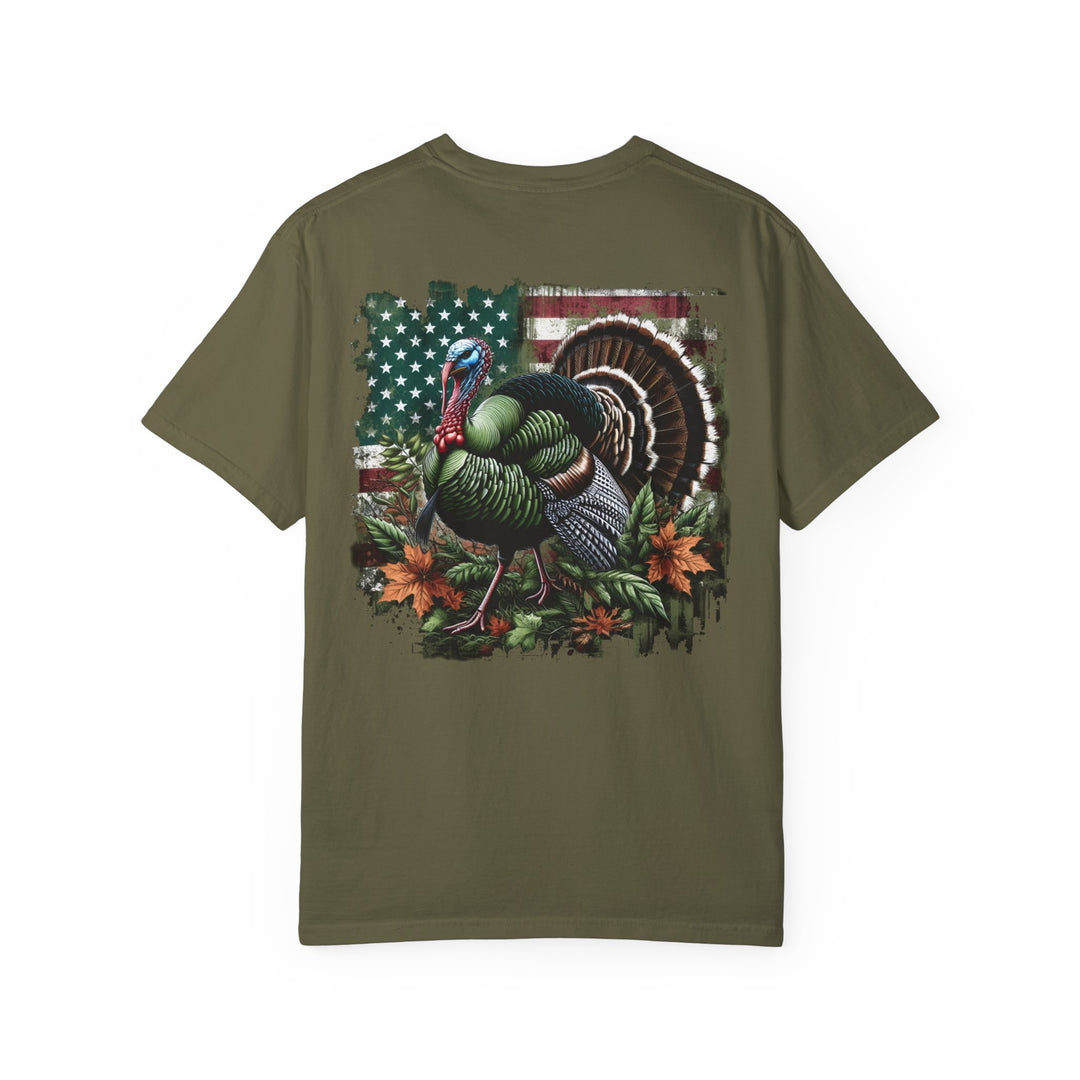 A green Turkey Hunting Tee in ring-spun cotton, featuring a turkey design. Garment-dyed for coziness, with a relaxed fit and double-needle stitching for durability. From Worlds Worst Tees.