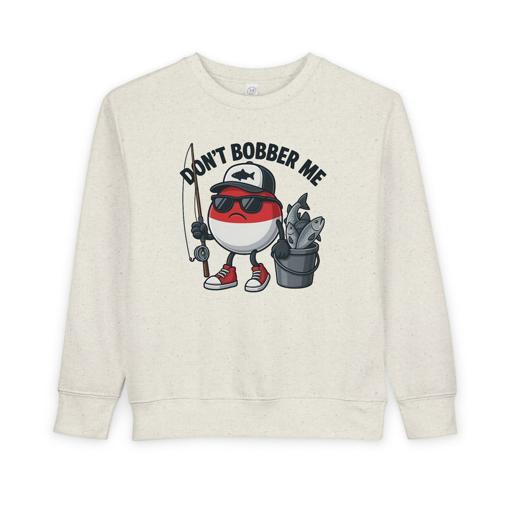 Don't Bobber Me Toddler Crew features a cartoon fishing bobber character with sunglasses and a fishing rod, offering cozy comfort in a soft cotton-polyester blend.