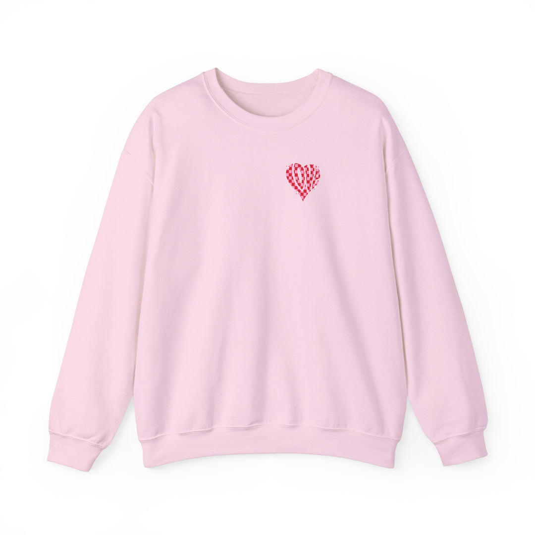 Unisex Love Crew pink sweatshirt with heart design. Heavy blend fabric, ribbed knit collar, no itchy seams. 50% cotton, 50% polyester. Loose fit, sewn-in label. Sizes S-5XL.