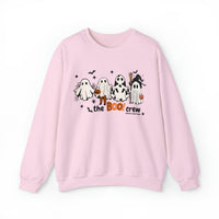 A pink sweatshirt featuring a playful design of ghosts, ideal for comfort in any situation. Unisex heavy blend crewneck with ribbed knit collar, 50% cotton, 50% polyester, loose fit, and sewn-in label.