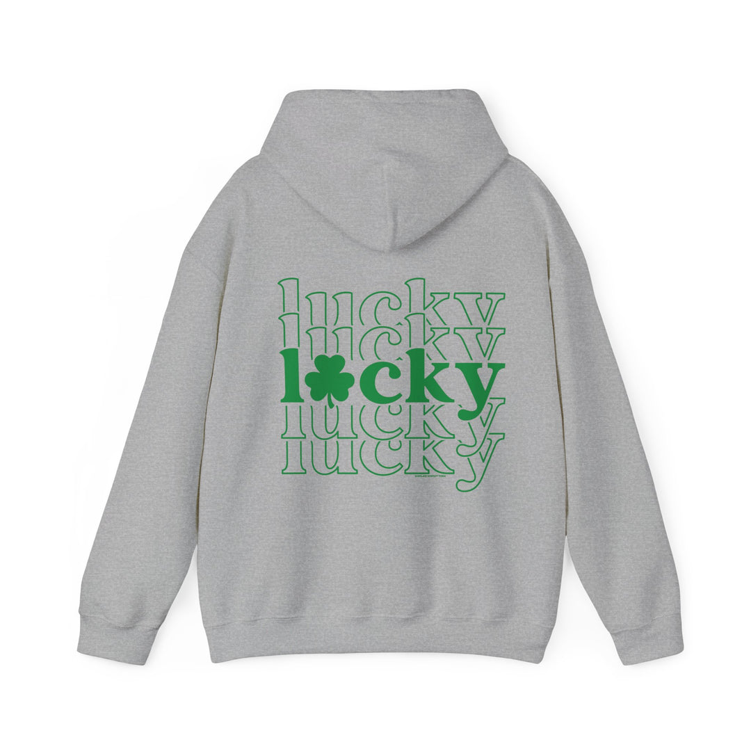 A grey Lucky Lucky Lucky Hoodie sweatshirt with green text, featuring a kangaroo pocket and matching hood drawstring. Unisex, cotton-polyester blend, cozy and stylish for cold days. Medium-heavy fabric, tear-away label, true to size.