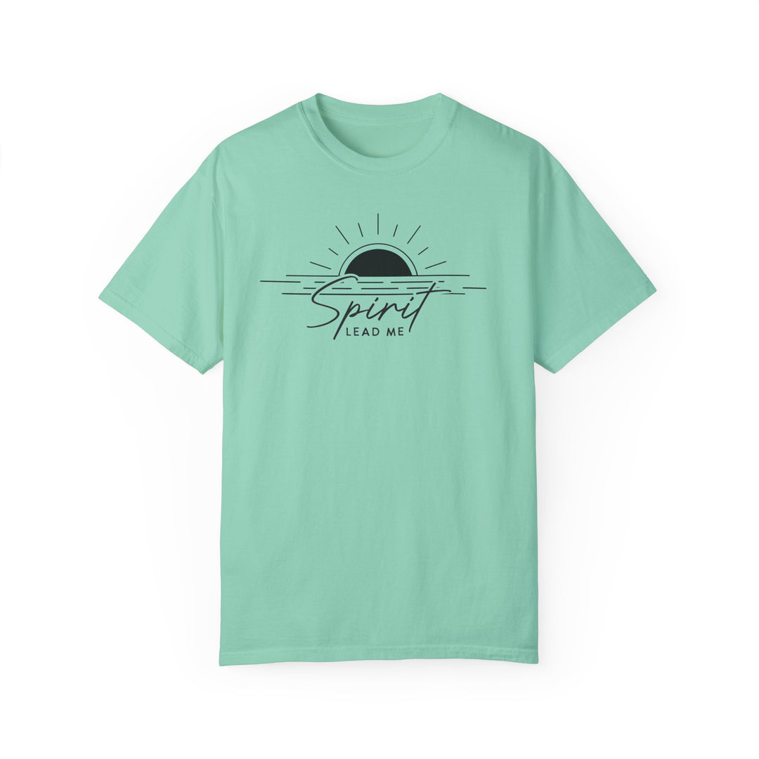 A Spirit Lead Me Tee, a green shirt with a logo and black text, made of 100% ring-spun cotton. Medium weight, relaxed fit, double-needle stitching for durability, no side-seams for tubular shape.