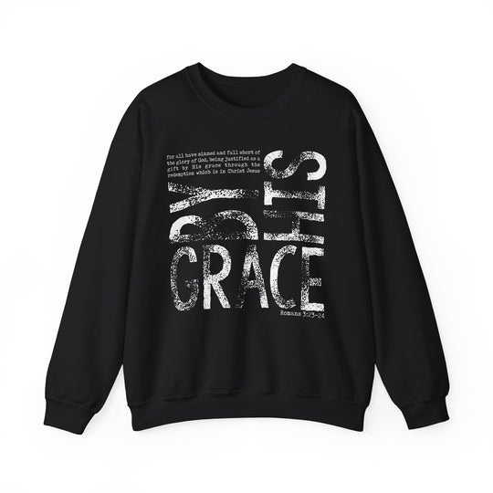 Black crew-neck sweatshirt with By Grace and Romans 3:23-24 in distressed white text, combining comfort and faith-inspired style.