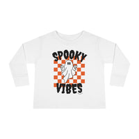 A spooky vibes toddler long sleeve tee featuring a white shirt with a ghost design. Made of 100% combed ringspun cotton, with a ribbed collar and shoulder-to-shoulder taping for durability and comfort.