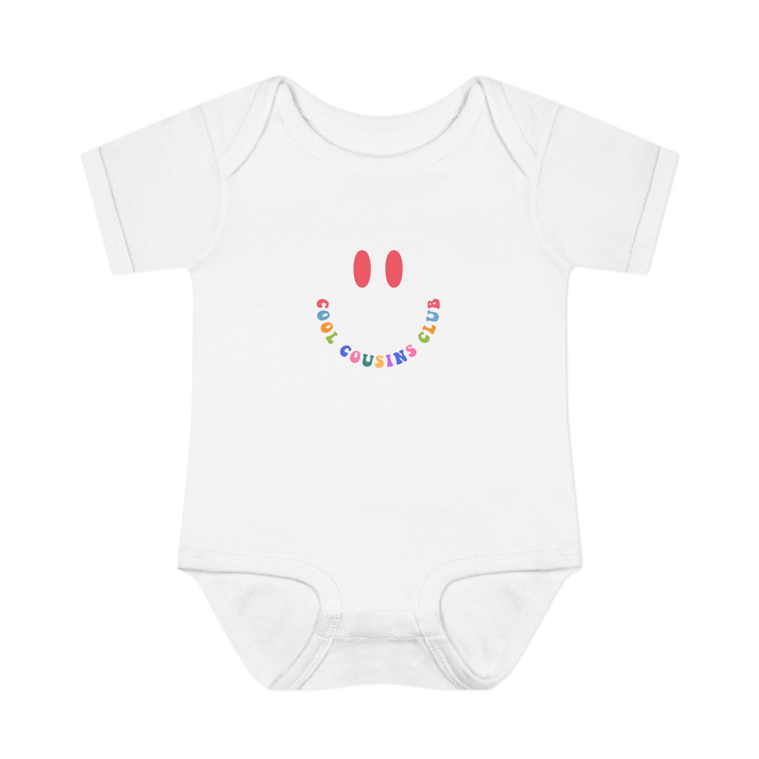 Infant bodysuit titled Cool Cousins Club Onesie, featuring a soft, 100% ring-spun cotton fabric with lap shoulders for easy adjustment. Suitable for ages 0-24 months.