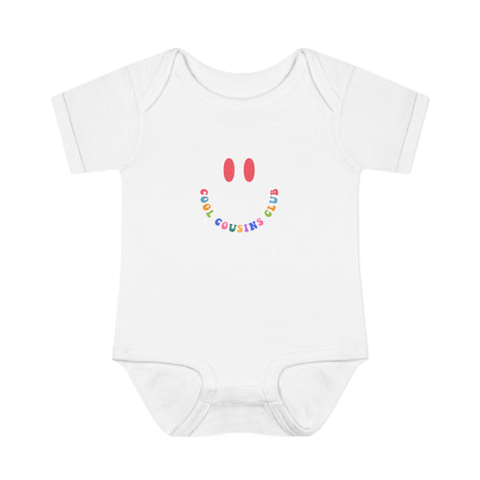 Infant bodysuit titled Cool Cousins Club Onesie, featuring a soft, 100% ring-spun cotton fabric with lap shoulders for easy adjustment. Suitable for ages 0-24 months.