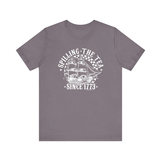 Grey t-shirt featuring a boat graphic and text, part of the Spilling the Tea Since 1773 Tee collection by Worlds Worst Tees. Unisex jersey tee with ribbed knit collar, 100% Airlume combed cotton, and tear away label.