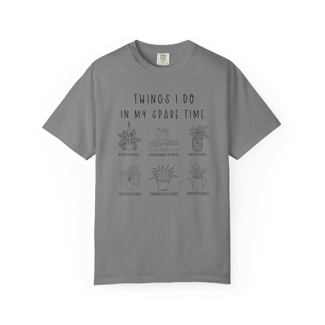 Heather-gray Plants Spare Time Tee featuring a plant-lover's bucket list with six illustrated tasks like repotting and watering plants, perfect for casual, comfortable wear.