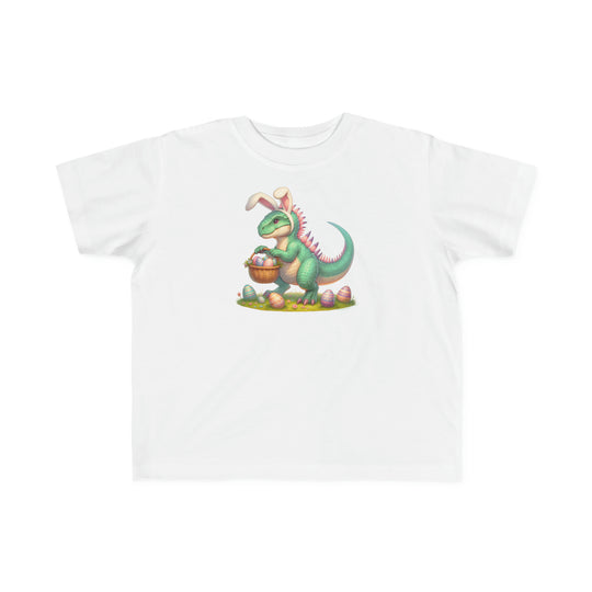 Toddler tee featuring Eggosaurus, a cartoon dinosaur holding a basket of eggs. Soft 100% combed ringspun cotton, light fabric, classic fit, tear-away label. Ideal for sensitive skin, perfect for little adventurers.