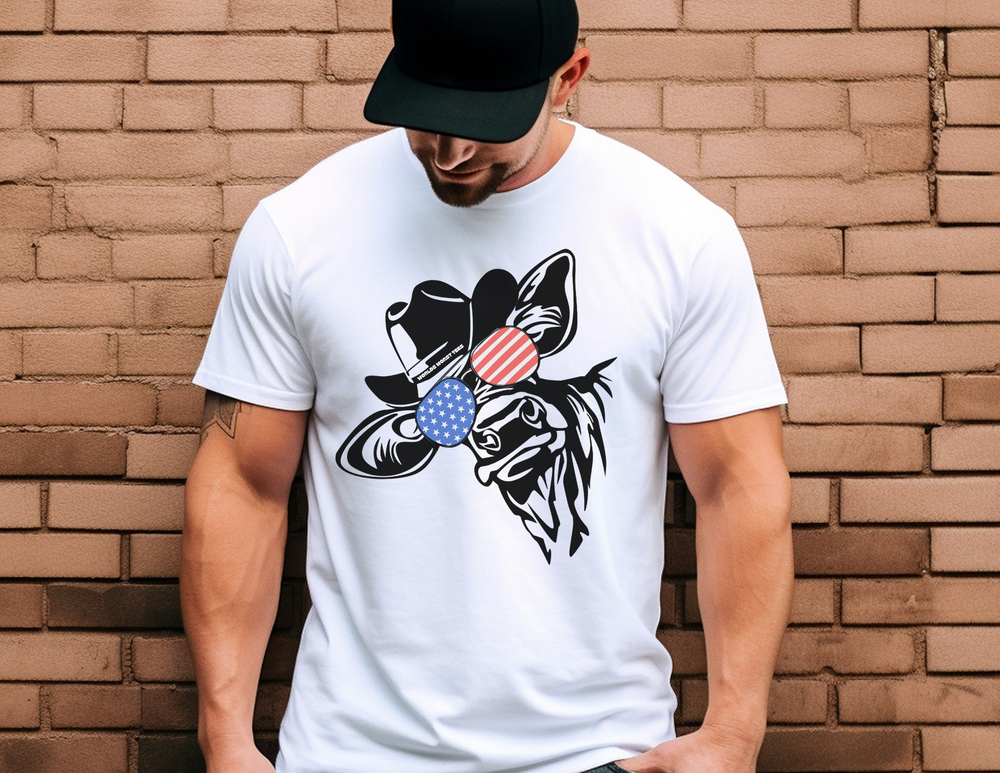 A man in a white shirt, wearing a hat and sunglasses, featuring a star pattern. Unisex heavy cotton tee, foundational casual wear with durable tape shoulders and ribbed collar. 100% cotton, classic fit.