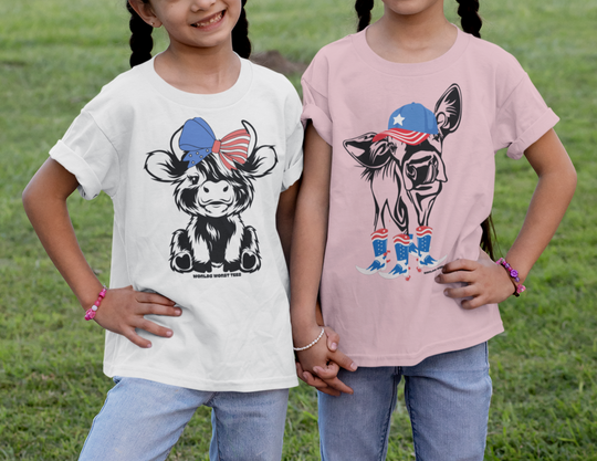 Kids 4th of July Family Cowgirl Tee, featuring two girls posing with a cow. 100% cotton, light fabric, classic fit, durable twill tape shoulders, and ribbed collar. Ideal for everyday wear.
