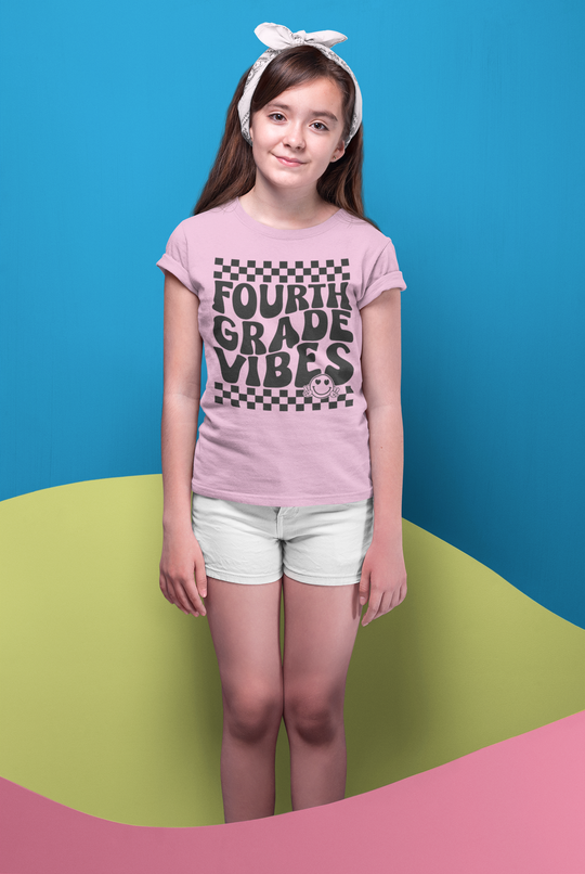 A kids heavy cotton tee in a classic fit, featuring 4th Grade Vibes. Made of 100% cotton, with twill tape shoulders for durability and tear-away label. Ideal for everyday wear.