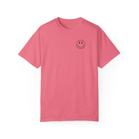 A relaxed fit God Day to Have a Good Day Tee, featuring a smiley face on a pink t-shirt. Made of 100% ring-spun cotton for comfort and durability, perfect for daily wear.