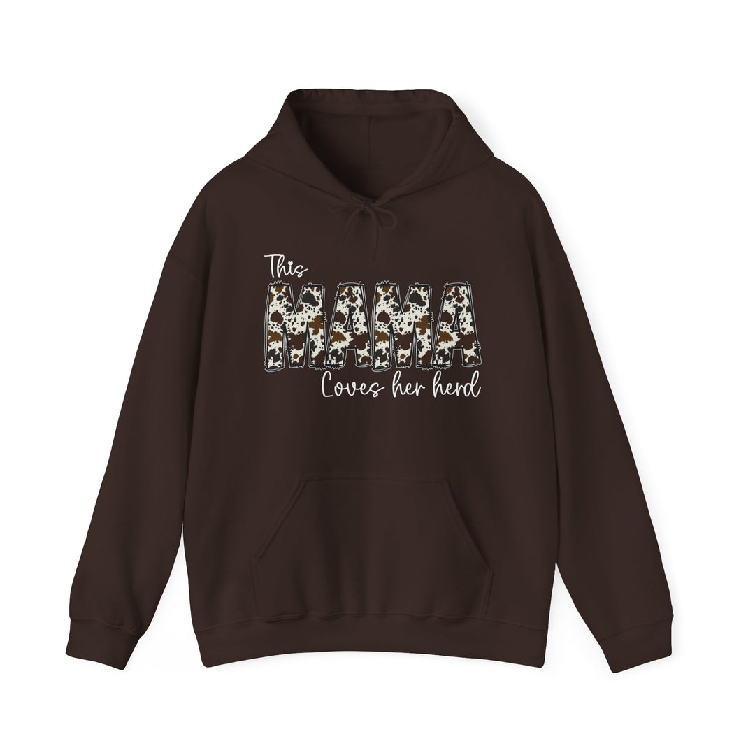 A Mama Herd Hoodie, a brown sweatshirt with white cow print text. Unisex heavy blend, cotton-polyester fabric, kangaroo pocket, classic fit. Ideal for warmth and comfort.
