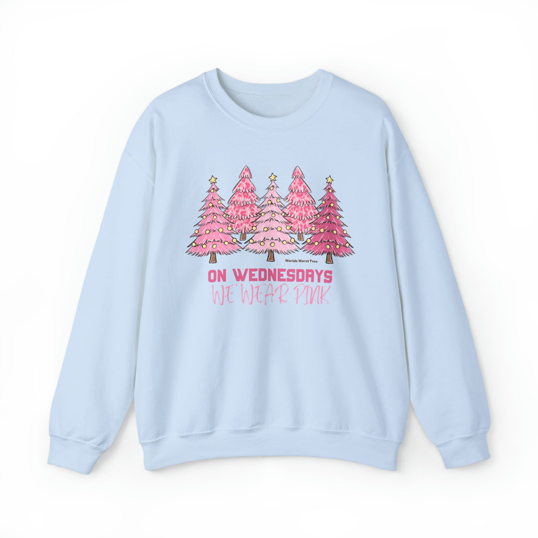 Unisex heavy blend crewneck sweatshirt featuring a unique pink Christmas tree design. Comfortable polyester-cotton fabric, ribbed knit collar, no itchy side seams. Sizes S-5XL. From 'Worlds Worst Tees'.