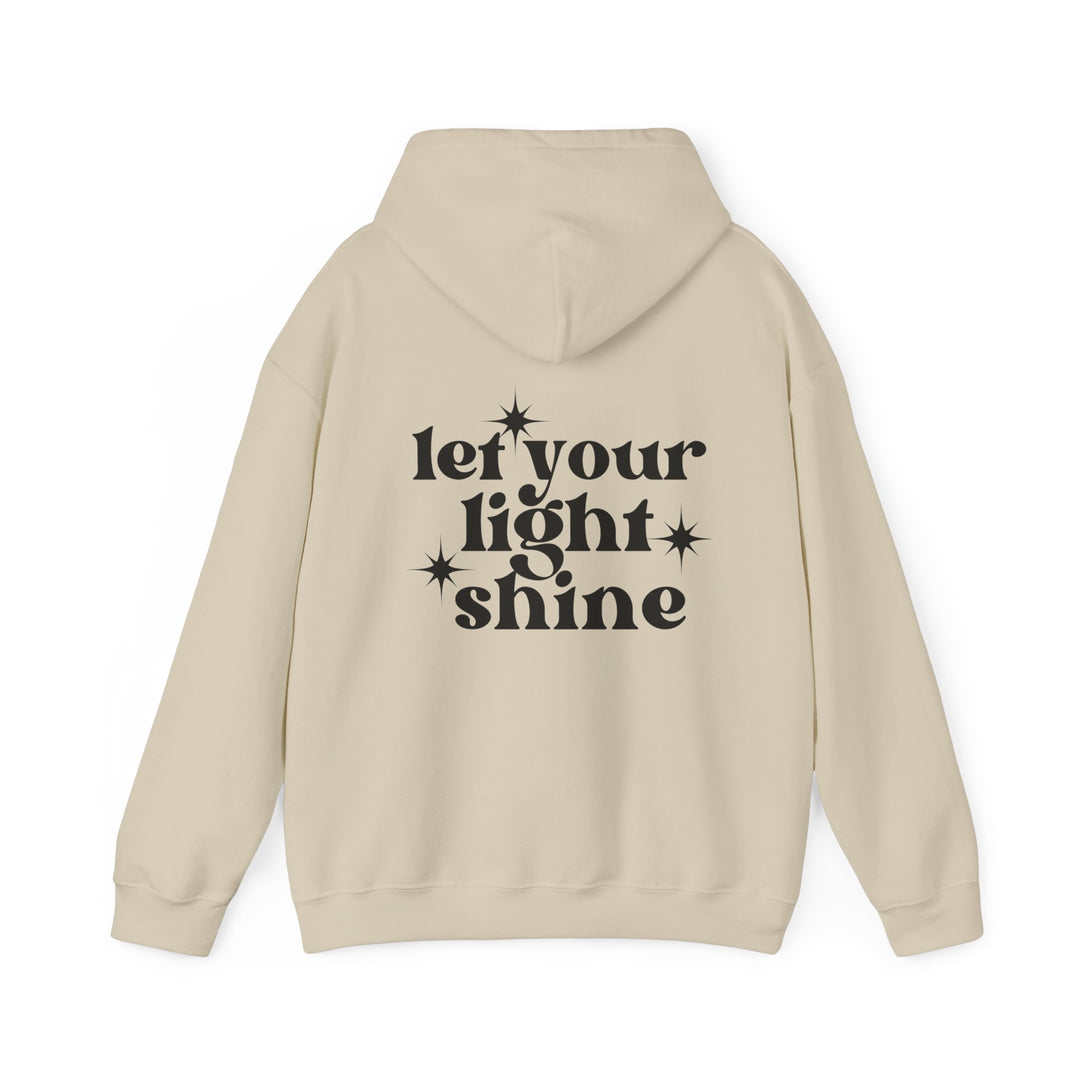 Unisex Let Your Light Shine Hoodie, white with black text, medium-heavy cotton-polyester blend, kangaroo pocket, drawstring hood. Cozy and stylish for cold days. From Worlds Worst Tees.