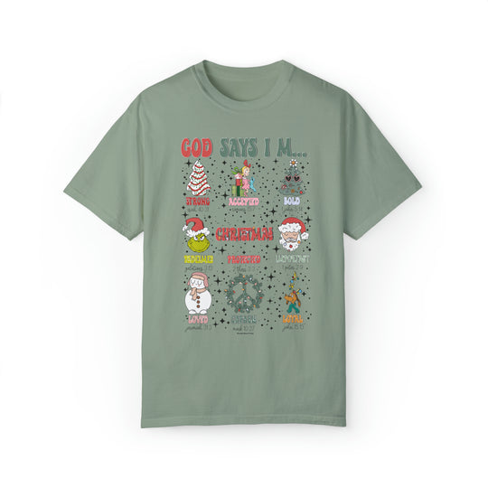 A green t-shirt featuring various Christmas characters like a snowman, Santa Claus, and a Christmas tree. Unisex, garment-dyed sweatshirt with a relaxed fit, made of 80% ring-spun cotton and 20% polyester.