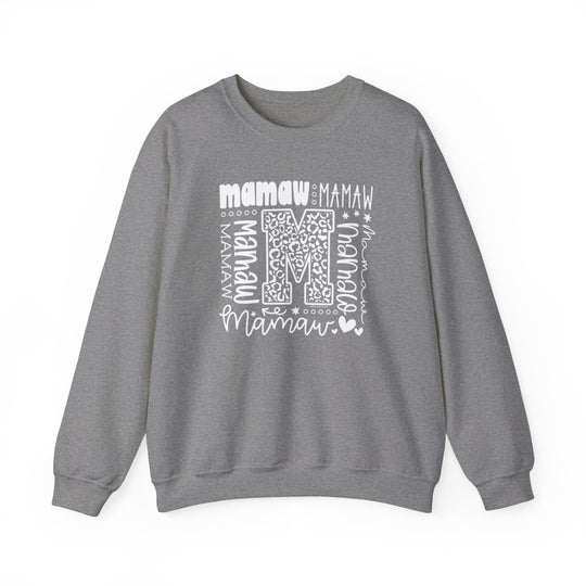 A unisex Mamaw Crew heavy blend sweatshirt, featuring white letters on grey fabric. Made of 50% cotton and 50% polyester for comfort and durability. Ideal for colder months with a classic fit and ribbed knit collar.