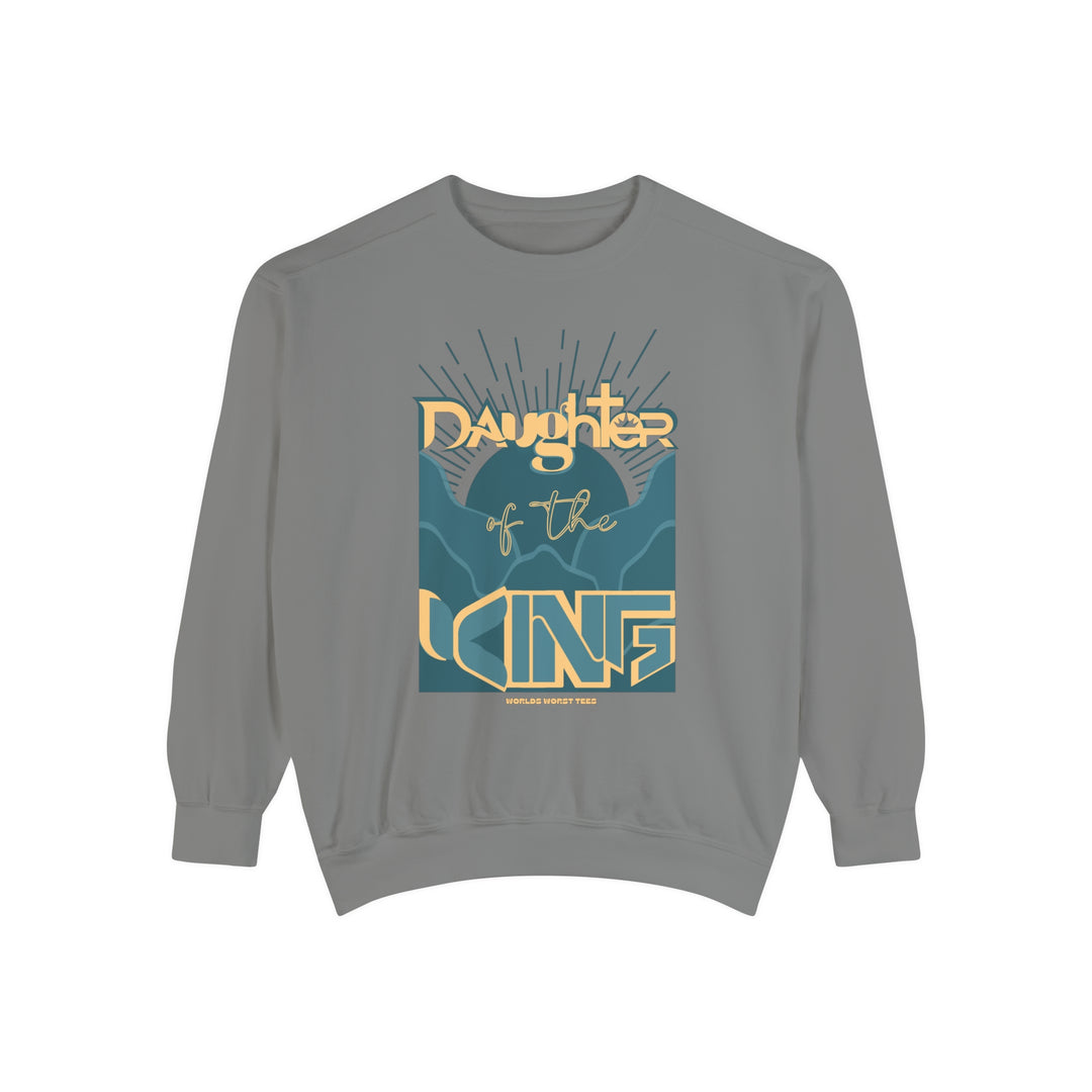 Daughter of the King Crew unisex sweatshirt, 80% ring-spun cotton, 20% polyester, relaxed fit, rolled-forward shoulder, back neck patch. Luxurious comfort in grey with yellow and blue text.