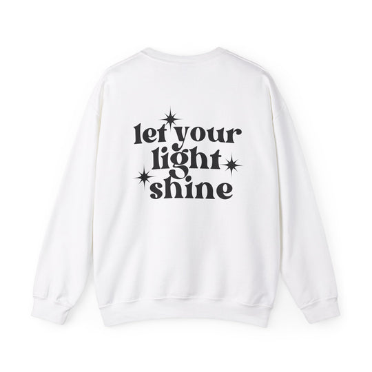 A unisex heavy blend crewneck sweatshirt featuring Let Your Light Shine Crew design. Ribbed knit collar, no itchy side seams, 50% Cotton 50% Polyester, loose fit, medium-heavy fabric. From Worlds Worst Tees.